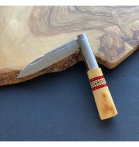 navaja decorada  G cenefa roja bloqueo